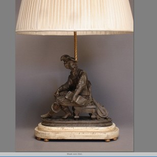 Antique Man On Bench Mounted As Lamp. 